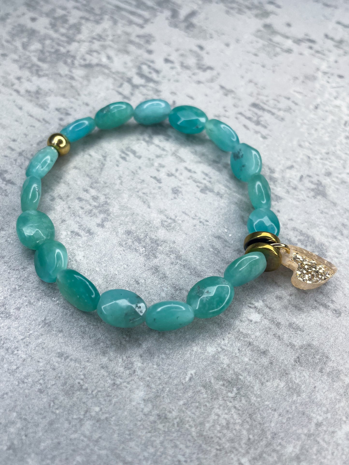 Faceted glass bead bracelet with heart